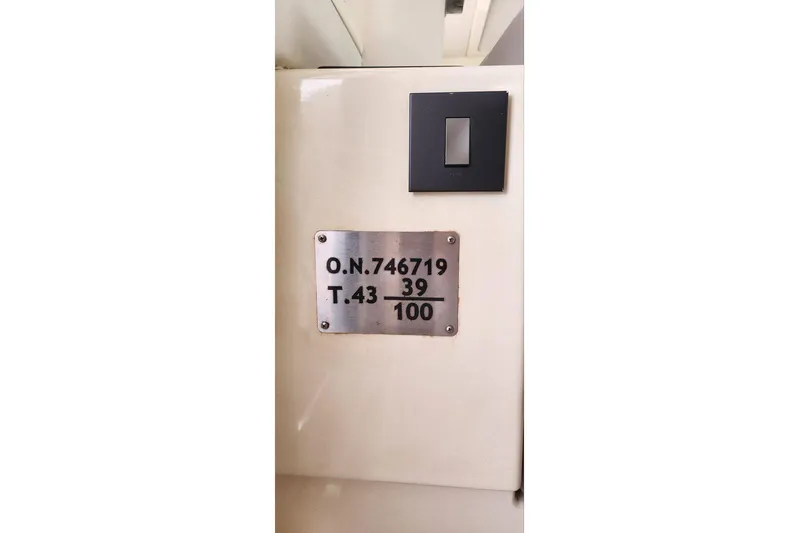 Jolly Dacha Yacht Photos Pics Plaque on Leopard 48 yacht, model year 2015, with identification numbers.