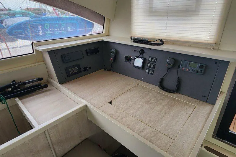 Jolly Dacha Yacht Photos Pics Interior of a 2015 Leopard 48 yacht with navigation equipment and control panel.