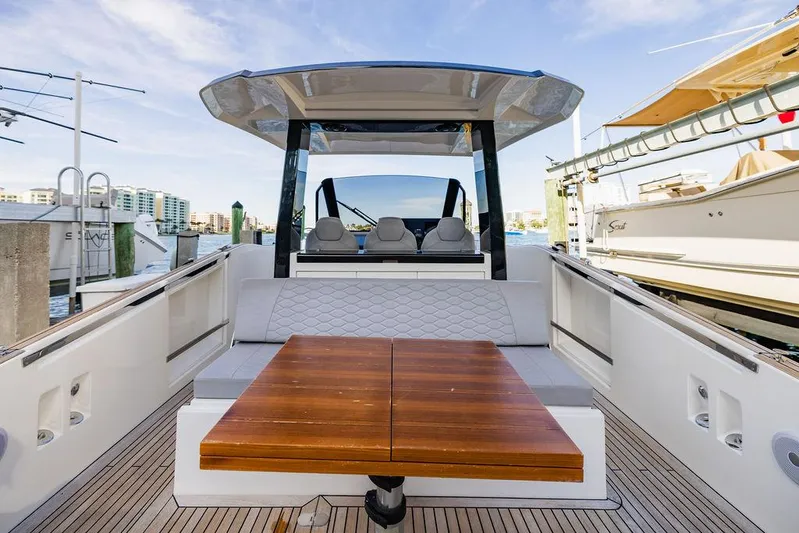  Yacht Photos Pics 2023 Astondoa 377 yacht with sleek deck and modern seating area.