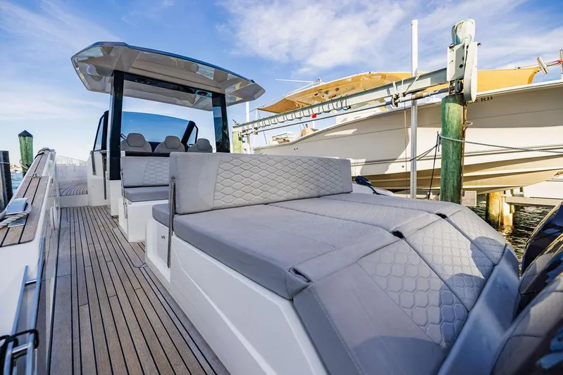  Yacht Photos Pics 2023 Astondoa 377 yacht with sleek design and spacious deck at marina.