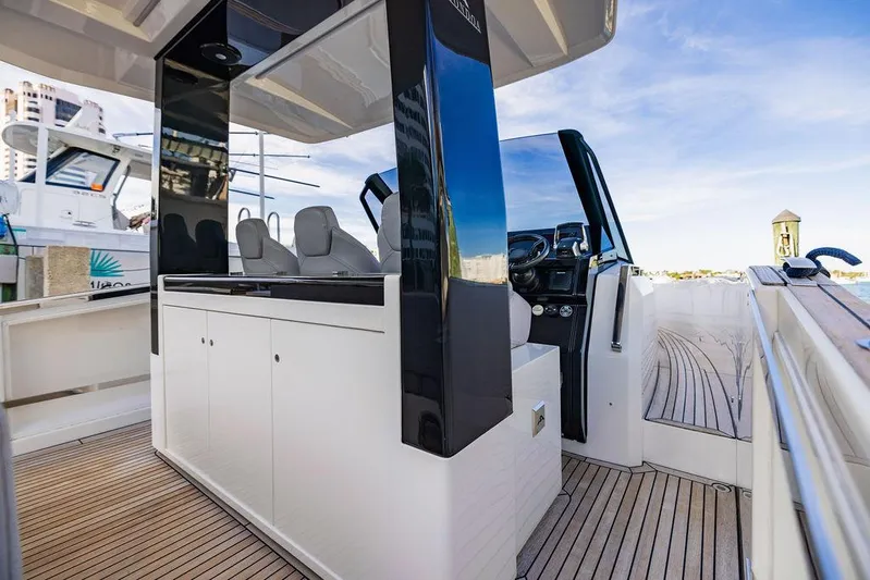  Yacht Photos Pics 2023 Astondoa 377 yacht interior with sleek design and modern helm station.