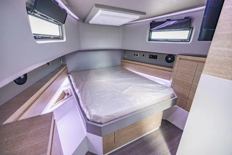  Yacht Photos Pics Luxurious cabin interior of 2023 Astondoa 377 yacht with modern design and ambient lighting.