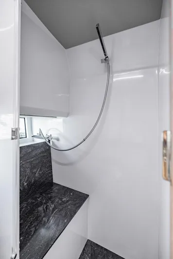  Yacht Photos Pics Modern bathroom interior of 2023 Astondoa 377 yacht with sleek design.