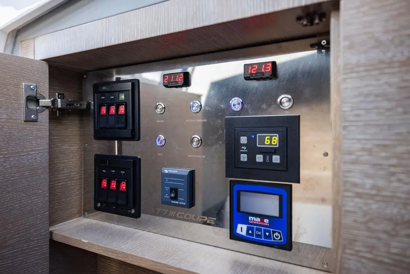  Yacht Photos Pics Control panel of 2023 Astondoa 377 yacht with digital displays and switches.
