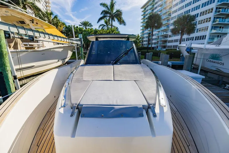  Yacht Photos Pics 2023 Astondoa 377 yacht docked, featuring sleek design and spacious deck.