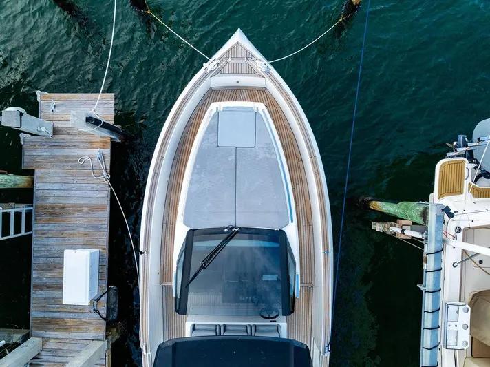  Yacht Photos Pics Top view of 2023 Astondoa 377 yacht docked at a marina.