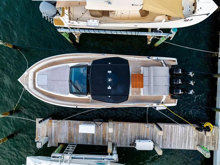 Yacht Photos Pics Top view of 2023 Astondoa 377 yacht docked at a marina.