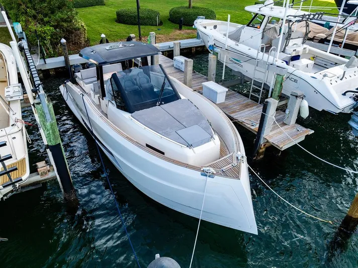  Yacht Photos Pics 2023 Astondoa 377 yacht docked at marina, sleek design, modern features.