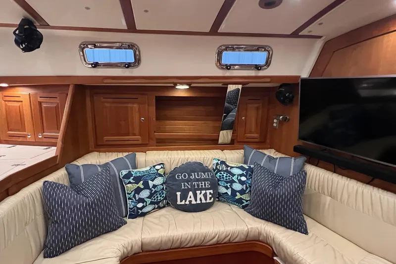  Yacht Photos Pics Luxurious 2017 Tartan 4300 yacht interior with cozy seating and decorative pillows.