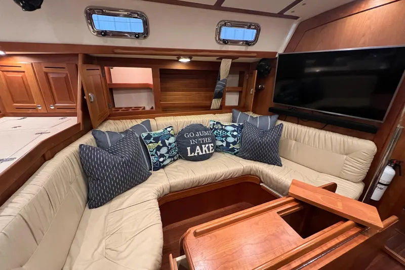 Yacht Photos Pics Luxurious 2017 Tartan 4300 yacht interior with cozy seating and decorative pillows.