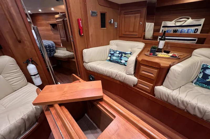 Yacht Photos Pics Luxurious 2017 Tartan 4300 yacht interior with cozy seating and elegant wooden finishes.