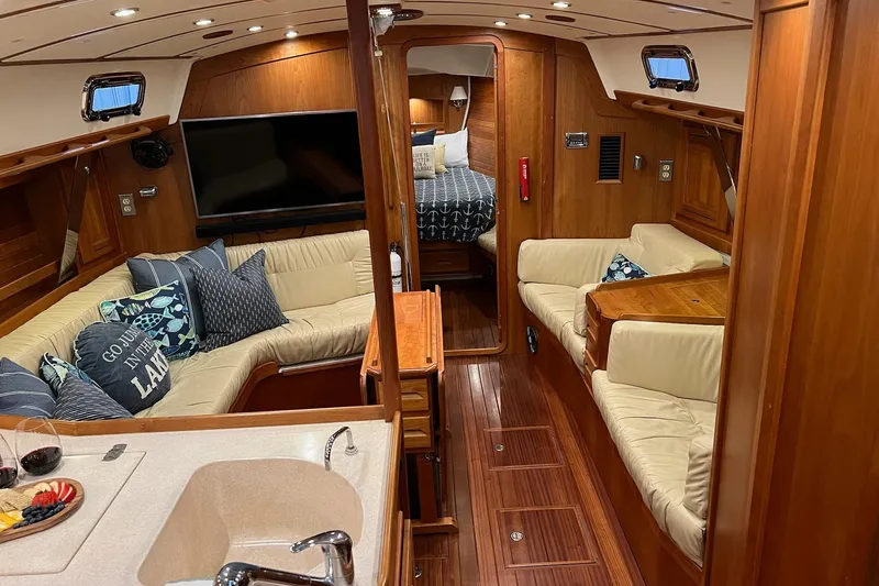  Yacht Photos Pics Luxurious 2017 Tartan 4300 yacht interior with cozy seating, wood finish, and modern amenities.
