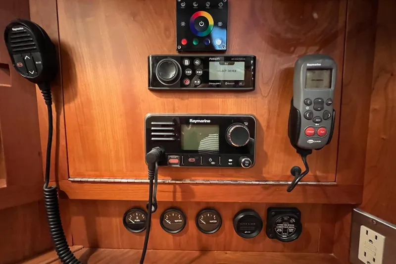  Yacht Photos Pics Control panel of a 2017 Tartan 4300 yacht with communication devices and gauges.