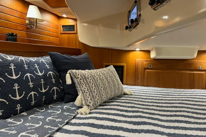  Yacht Photos Pics Cozy Tartan 4300 yacht cabin with nautical-themed bedding, 2017 model.