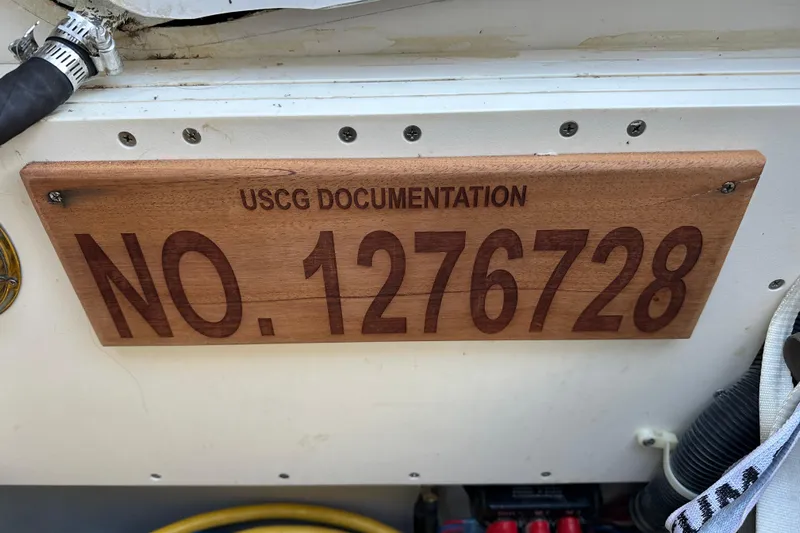  Yacht Photos Pics USCG documentation plaque on 2017 Tartan 4300 boat, number 1276728.