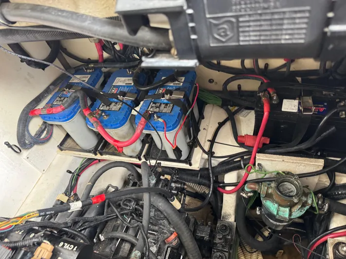 Idylwilde Yacht Photos Pics Engine compartment of 2018 Sea Ray Sundancer 350 Coupe with batteries and wiring.