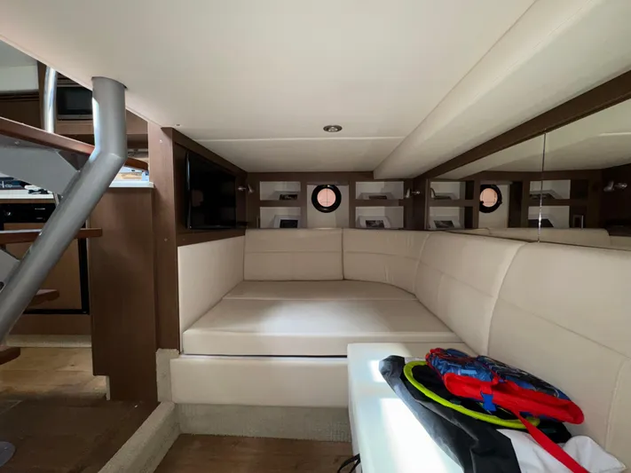 Idylwilde Yacht Photos Pics Interior of 2018 Sea Ray Sundancer 350 Coupe with beige seating and modern design.