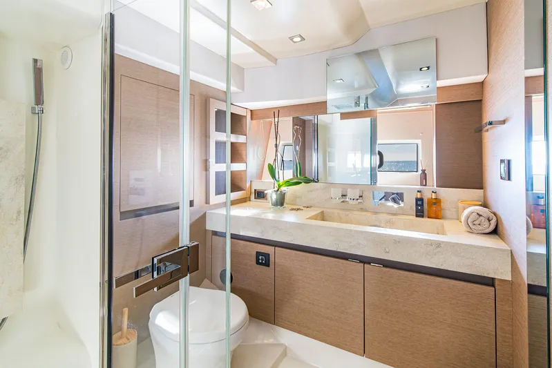  Yacht Photos Pics Luxurious bathroom in a 2016 Prestige 680 yacht, featuring modern fixtures and elegant design.