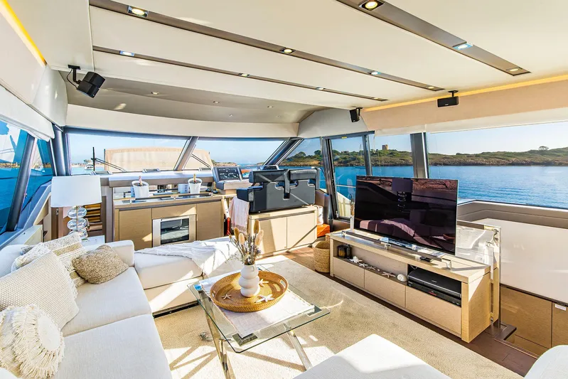  Yacht Photos Pics Luxurious interior of a 2016 Prestige 680 yacht with modern furnishings and panoramic views.