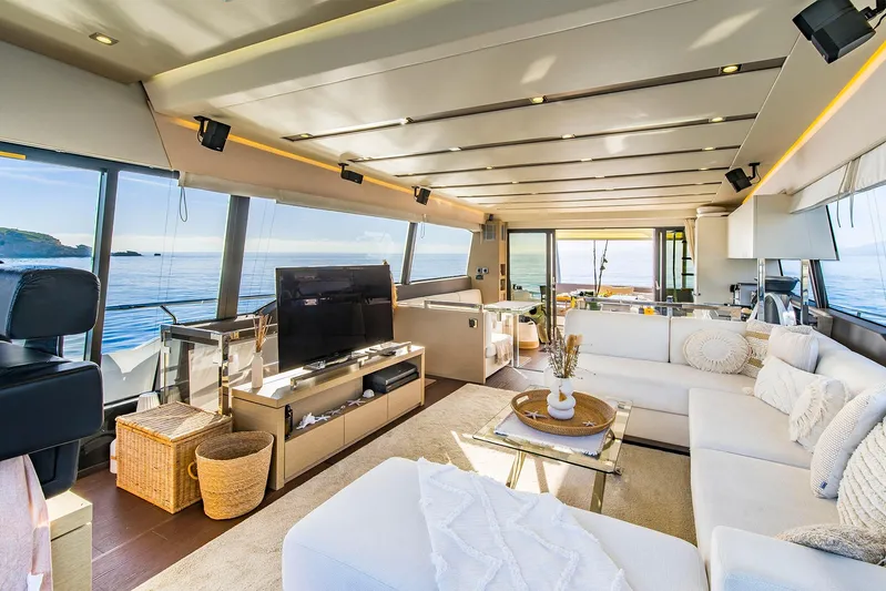  Yacht Photos Pics Luxurious interior of a 2016 Prestige 680 yacht with modern furnishings and ocean view.