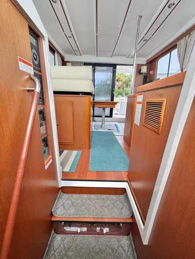 Amour Yacht Photos Pics Interior of 2018 Beneteau Swift Trawler 34, featuring wooden finishes and modern design.