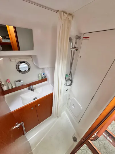 Amour Yacht Photos Pics Bathroom of 2018 Beneteau Swift Trawler 34 with shower and sink.