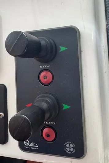 Amour Yacht Photos Pics Control panel of a 2018 Beneteau Swift Trawler 34 with bow and stern thruster controls.