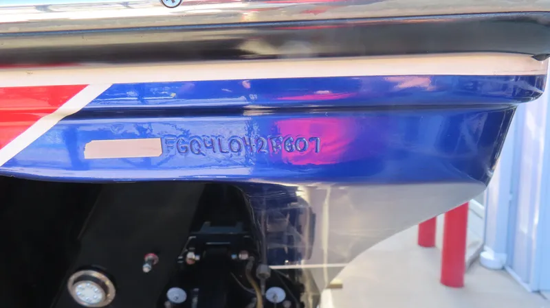  Yacht Photos Pics 2007 Fountain 42 Lightning boat hull with identification number, featuring blue and red design.