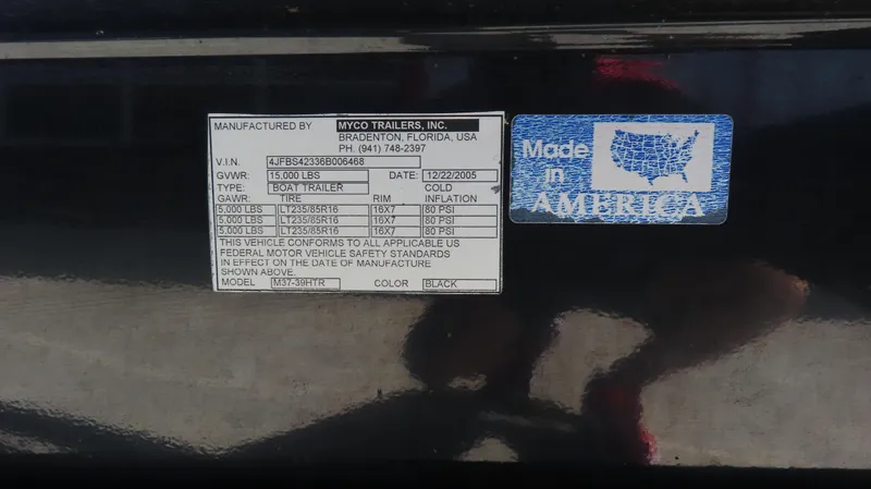  Yacht Photos Pics Label on a black 2007 Fountain 42 Lightning boat trailer, "Made in America" sticker visible.