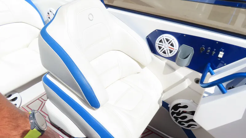  Yacht Photos Pics White and blue seat in 2007 Fountain 42 Lightning boat cockpit.