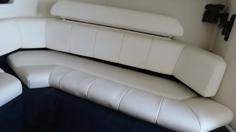  Yacht Photos Pics 2007 Fountain 42 Lightning boat interior with white leather seating.