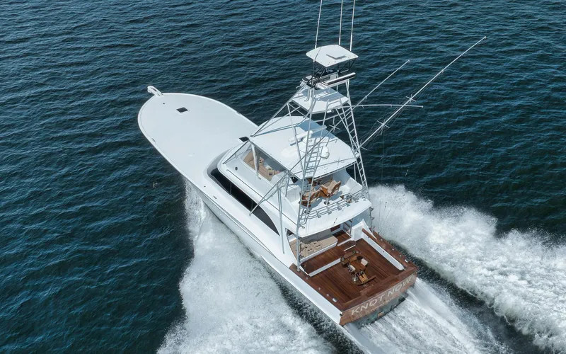Knot Now Yacht Photos Pics Aerial view of 1997 Miller Marine Custom Carolina yacht cruising on open water.