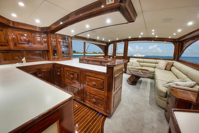 Knot Now Yacht Photos Pics Luxurious 1997 Miller Marine Custom Carolina yacht interior with elegant wood finishes and ocean view.