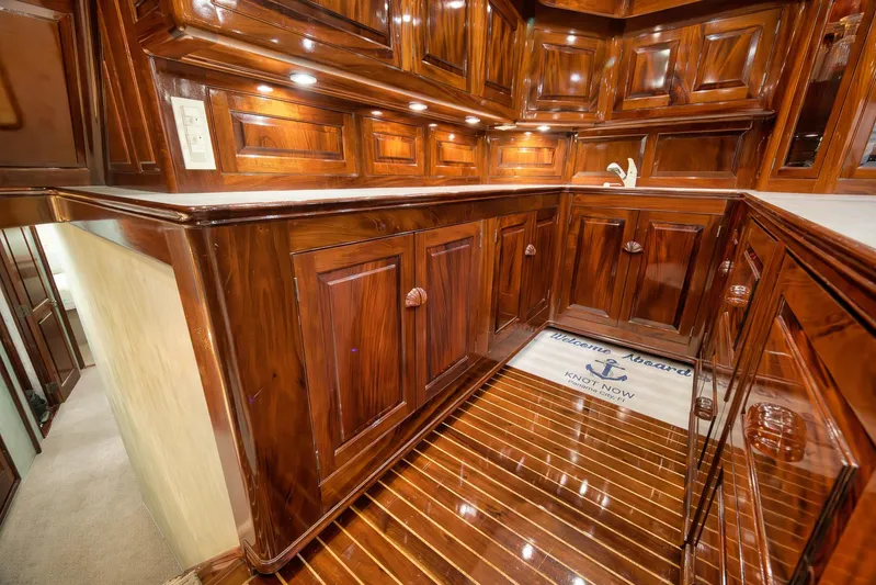 Knot Now Yacht Photos Pics Luxurious wooden interior of 1997 Miller Marine Custom Carolina yacht kitchen.