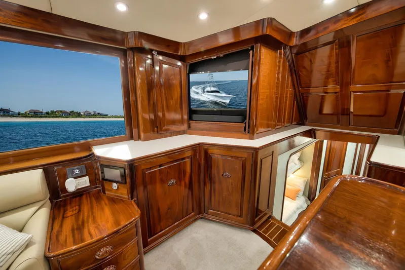 Knot Now Yacht Photos Pics Luxurious 1997 Miller Marine Custom Carolina yacht interior with polished wood cabinetry and ocean view.
