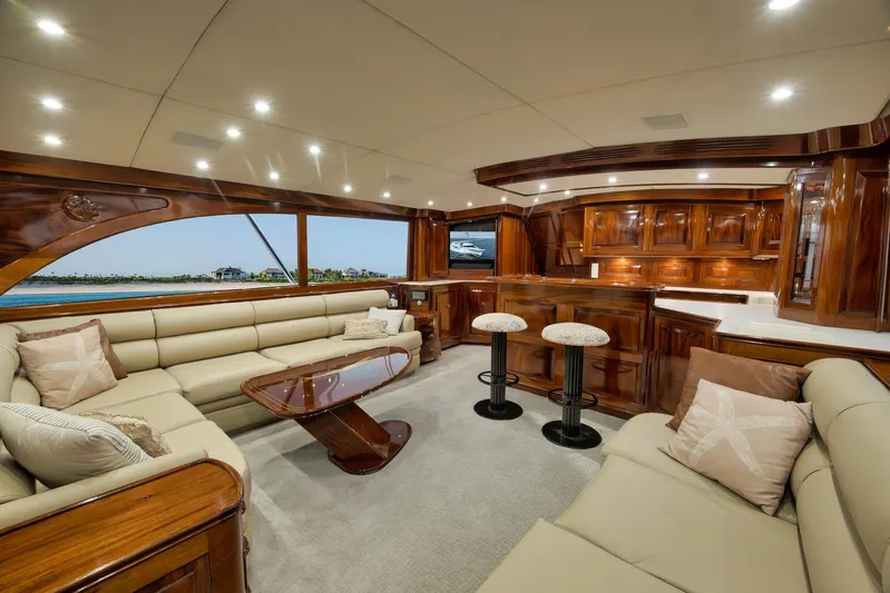 Knot Now Yacht Photos Pics Luxurious 1997 Miller Marine Custom Carolina yacht interior with elegant wood finishes and plush seating.