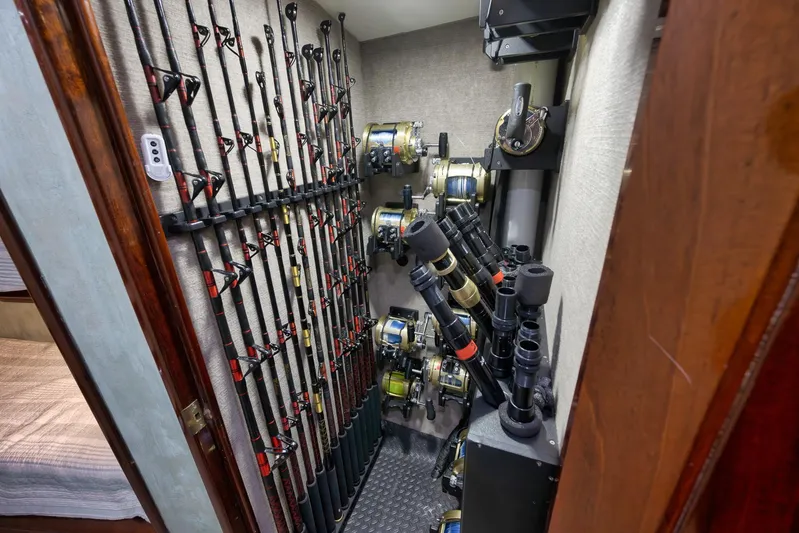 Knot Now Yacht Photos Pics Fishing rods and reels storage on a 1997 Miller Marine Custom Carolina boat.