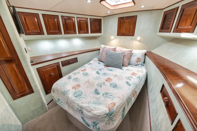 Knot Now Yacht Photos Pics Luxurious cabin interior of 1997 Miller Marine Custom Carolina yacht with elegant wood finishes.