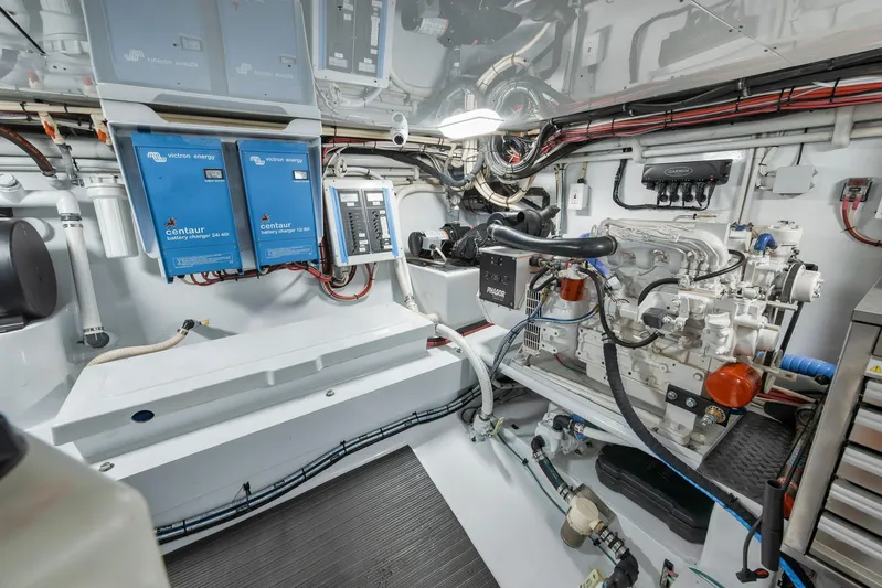 Knot Now Yacht Photos Pics Engine room of 1997 Miller Marine Custom Carolina boat with Victron Energy chargers.