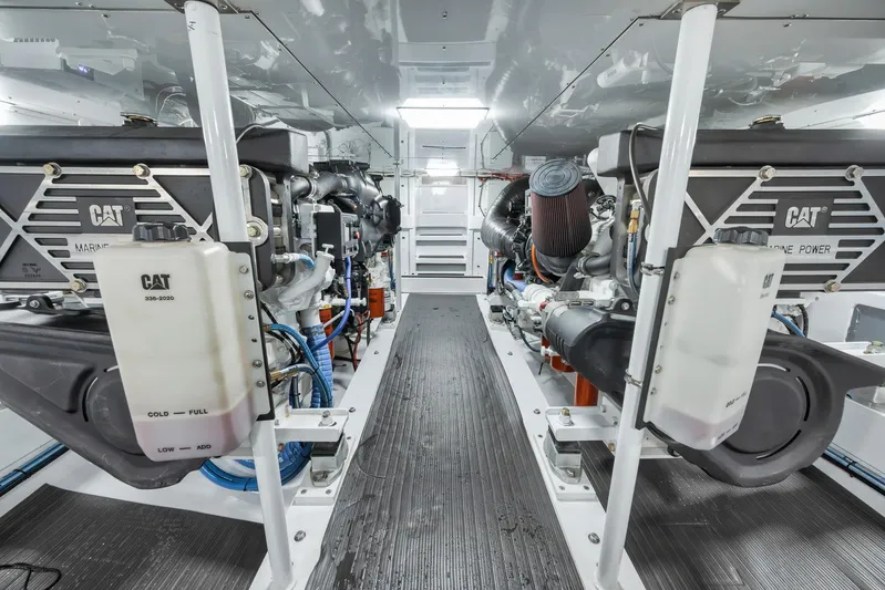 Knot Now Yacht Photos Pics Engine room of 1997 Miller Marine Custom Carolina with CAT marine engines.