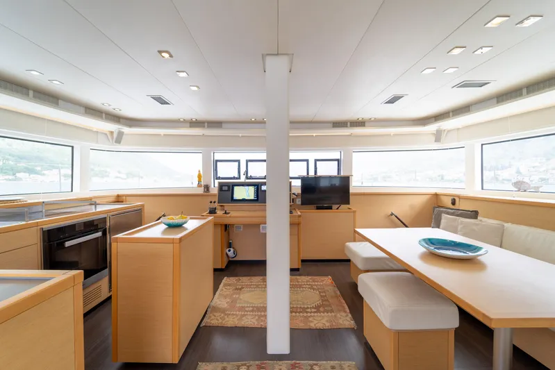  Yacht Photos Pics Interior of 2015 Lagoon 52 F yacht with modern kitchen and dining area.