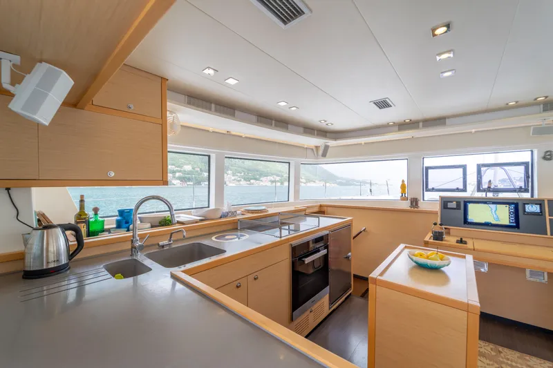  Yacht Photos Pics Modern kitchen interior on 2015 Lagoon 52 F yacht with panoramic windows and sleek design.