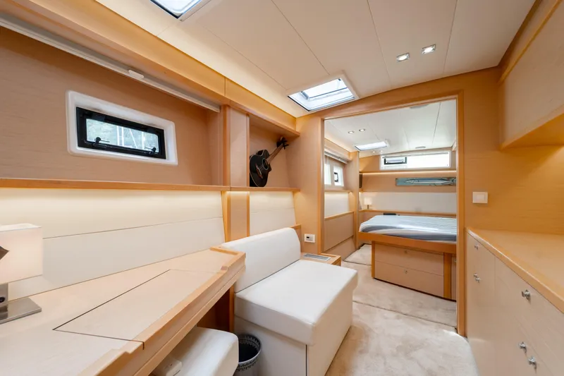  Yacht Photos Pics Luxurious interior of 2015 Lagoon 52 F yacht with modern furnishings and natural light.