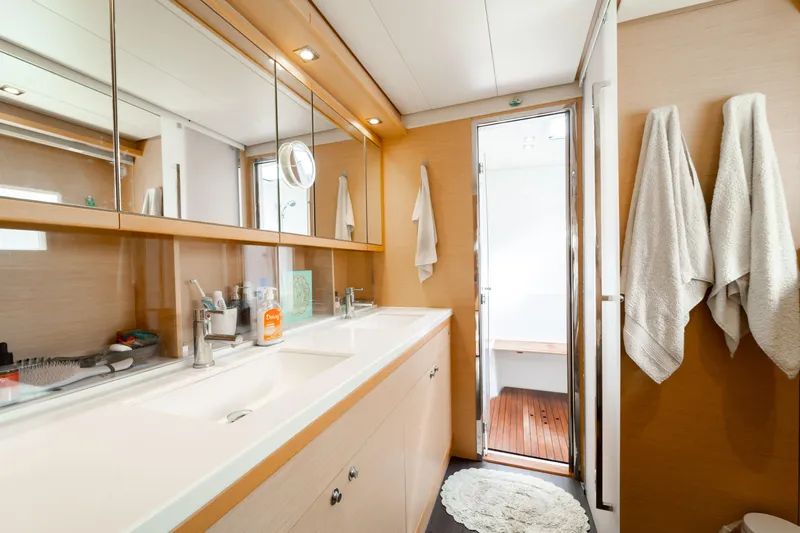  Yacht Photos Pics Luxurious bathroom interior of 2015 Lagoon 52 F yacht with double sinks and modern design.