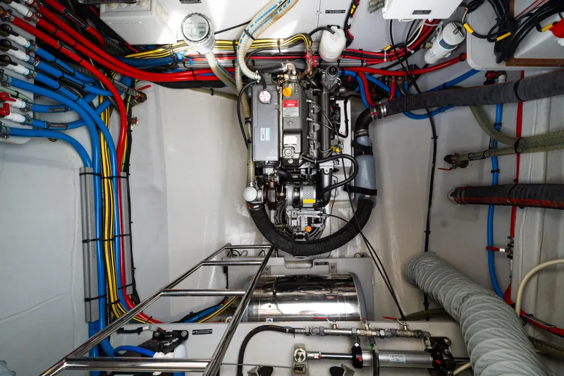  Yacht Photos Pics Engine room of a 2015 Lagoon 52 F yacht, showcasing wiring and machinery.
