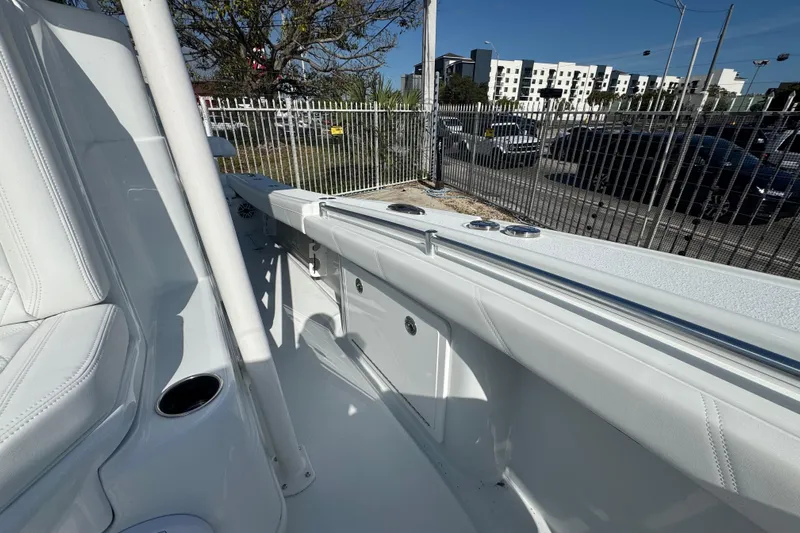  Yacht Photos Pics 2026 Yellowfin 26 Hybrid boat interior with white seating and sleek design.