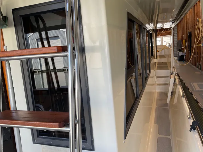  Yacht Photos Pics 1991 Nordic Pilothouse boat interior with sleek design and wooden accents.