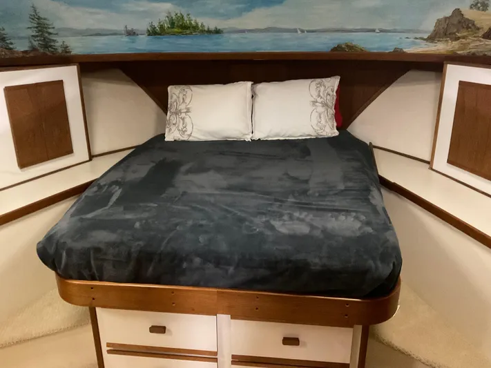  Yacht Photos Pics Cozy Nordic Pilothouse 1991 boat cabin with bed and scenic mural.