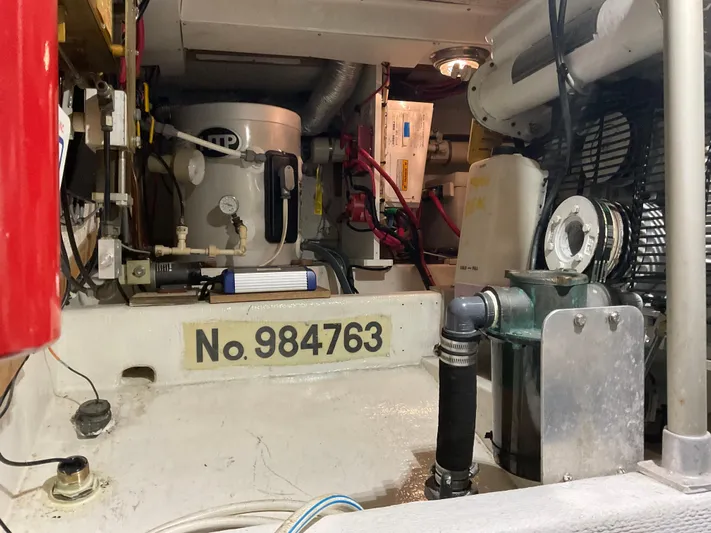  Yacht Photos Pics Engine room of a 1991 Nordic Pilothouse boat, showing equipment and serial number 984763.