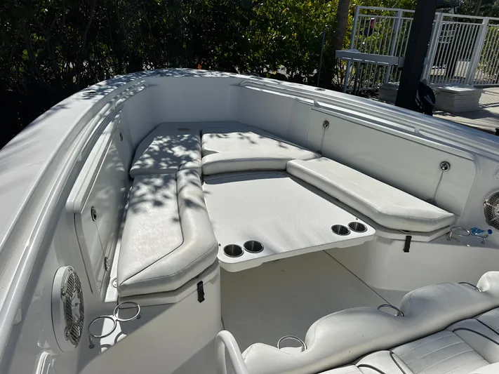  Yacht Photos Pics 2008 Everglades 350 CC boat interior with cushioned seating and cup holders.